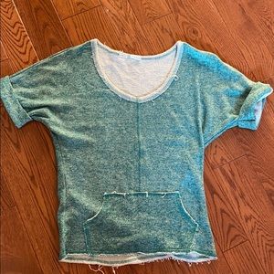 Short sleeved sweater top with front pocket